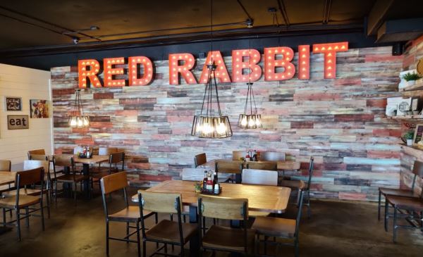 Photo of neon sign saying Rabbit Grill